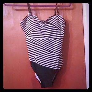 Swimsuit one piece very cute! Never worn